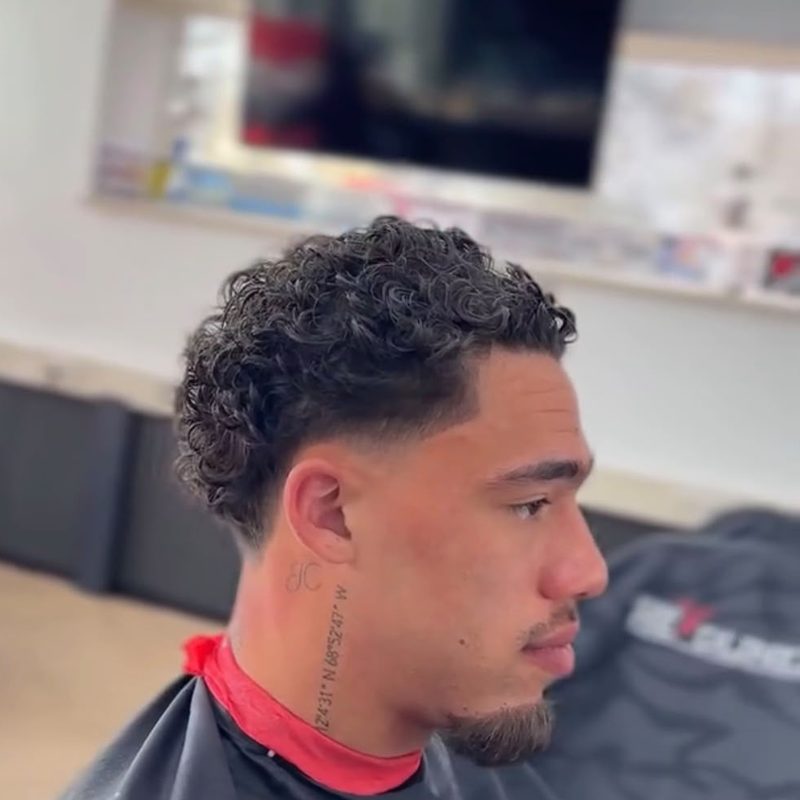 Dreads met taper fade